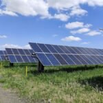 Best solar panels for cloudy weather installed on a modern home's rooftop under an overcast sky.