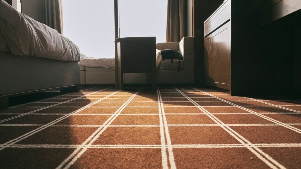 Best flooring for your home featuring hardwood, luxury vinyl, tile, laminate, and carpet flooring options in a modern house