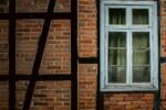 gap between window frame and interior wall before repair
