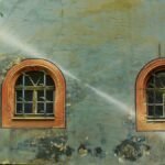 Brown water stain on a white painted wall