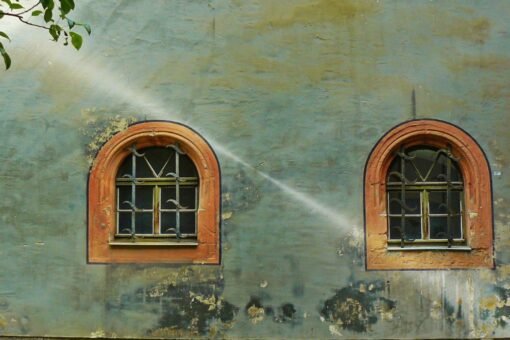 Brown water stain on a white painted wall