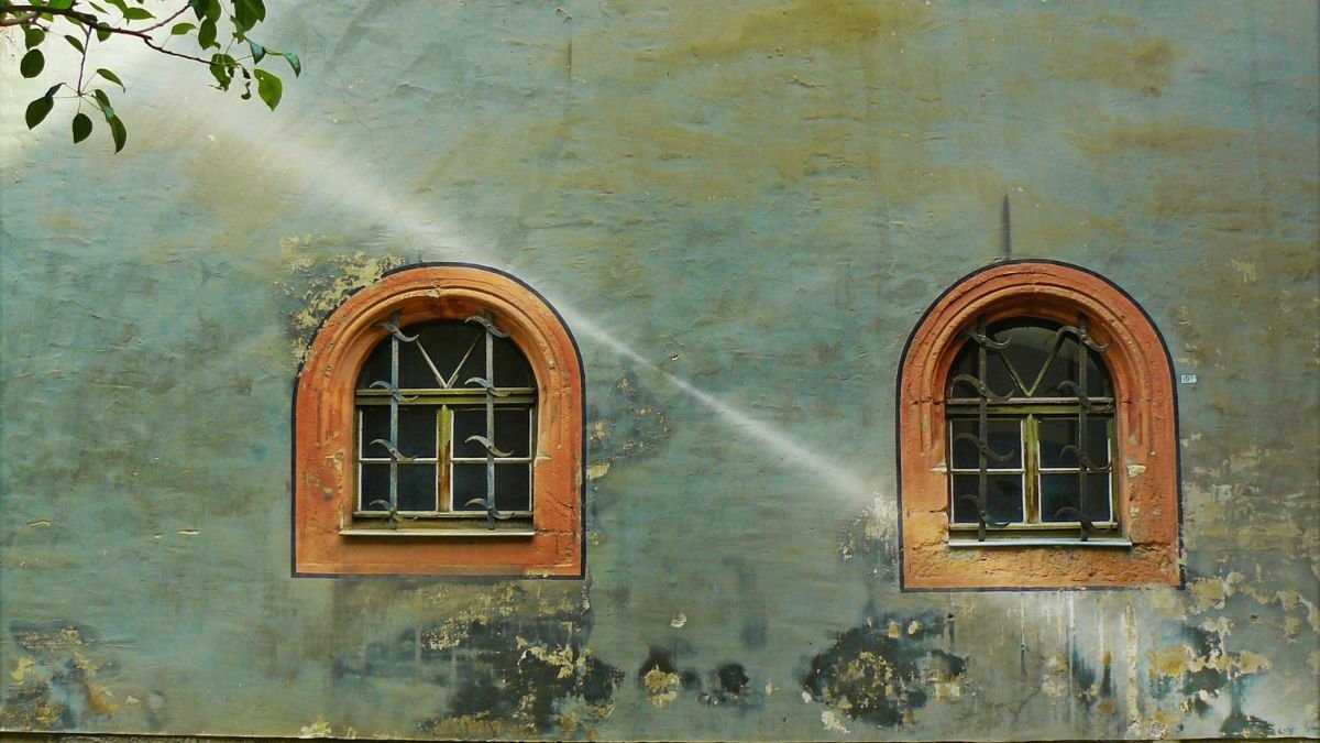 Brown water stain on a white painted wall